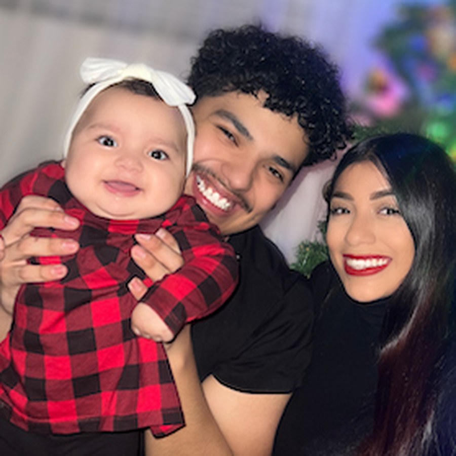 Zayda's family smiling together